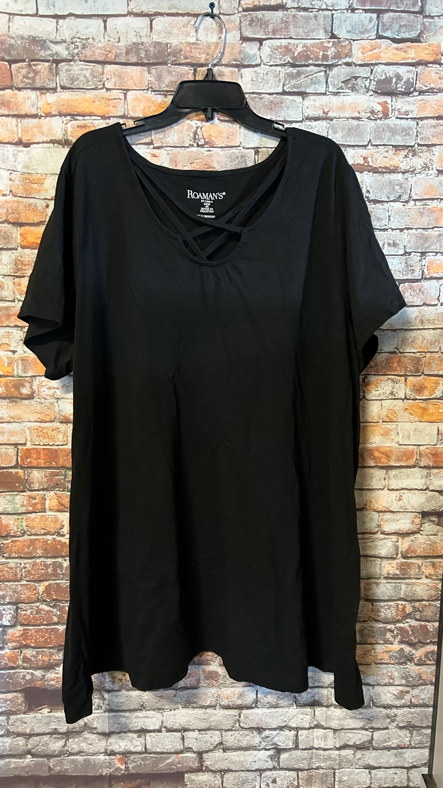 Women’s size 4x fits a nice roomy 3x top With stretch