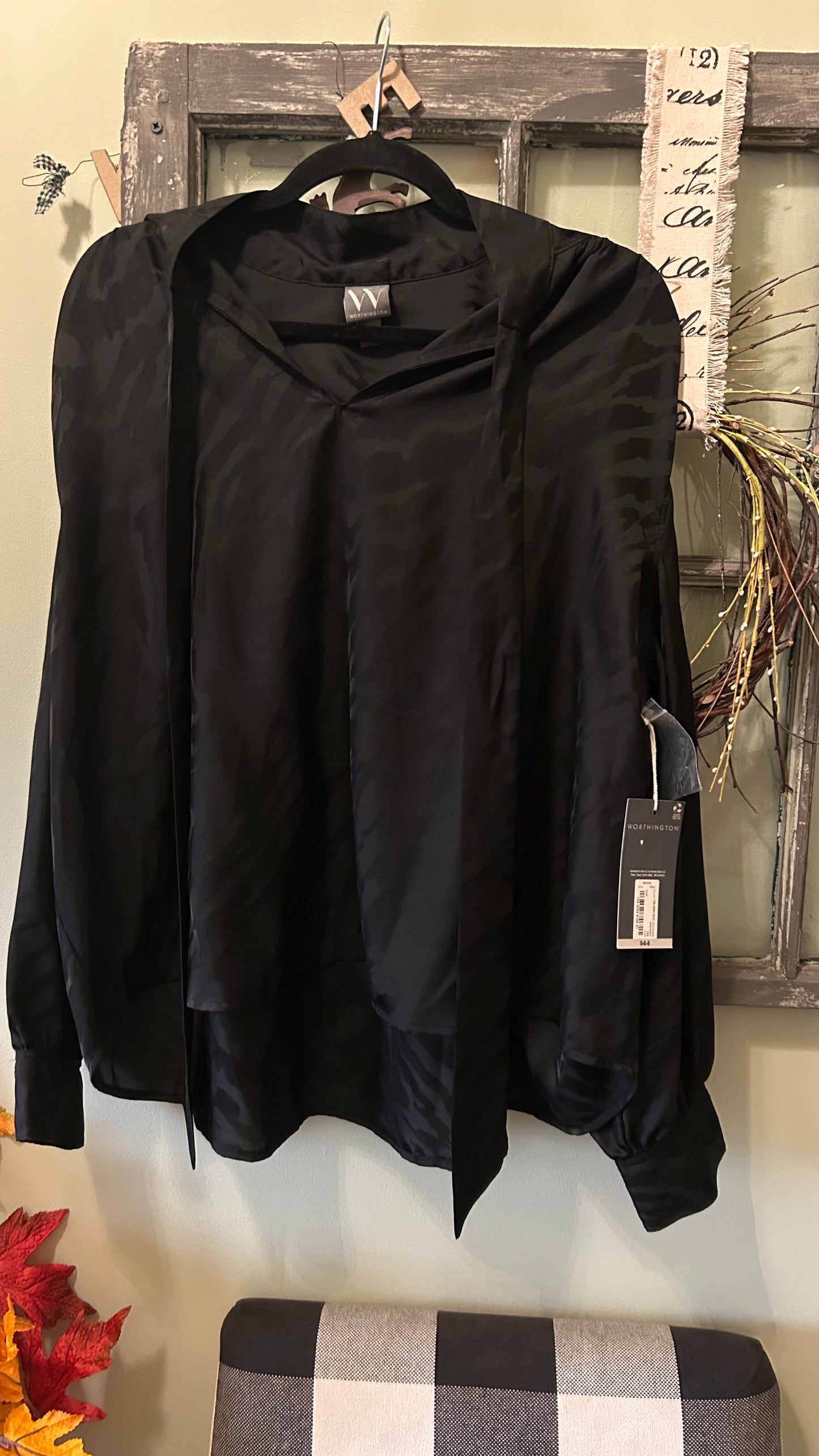 Women’s top size 3x petite fits like a roomy 1x no stretch