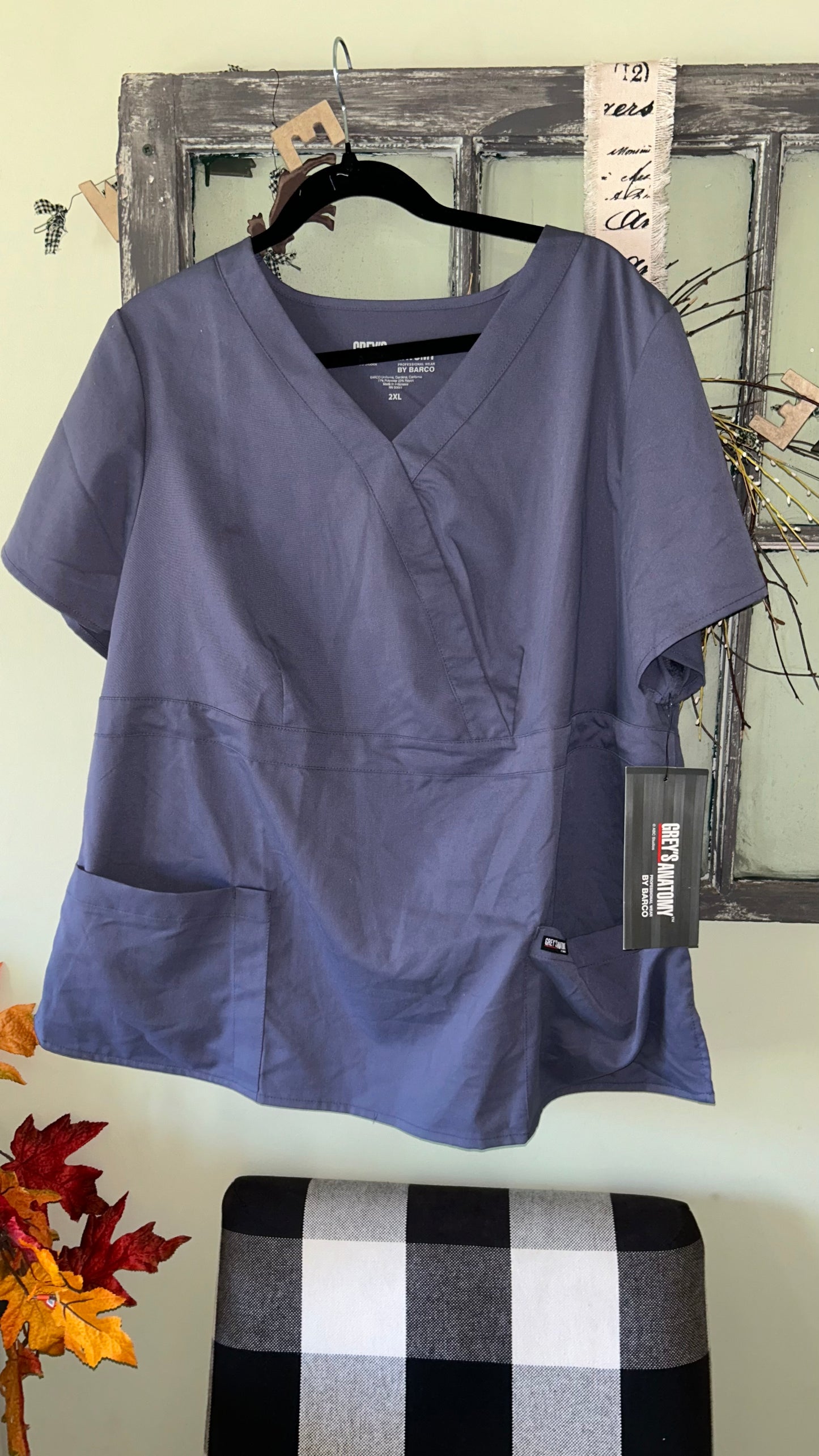 Women’s size 2x scrub top fits like a 16