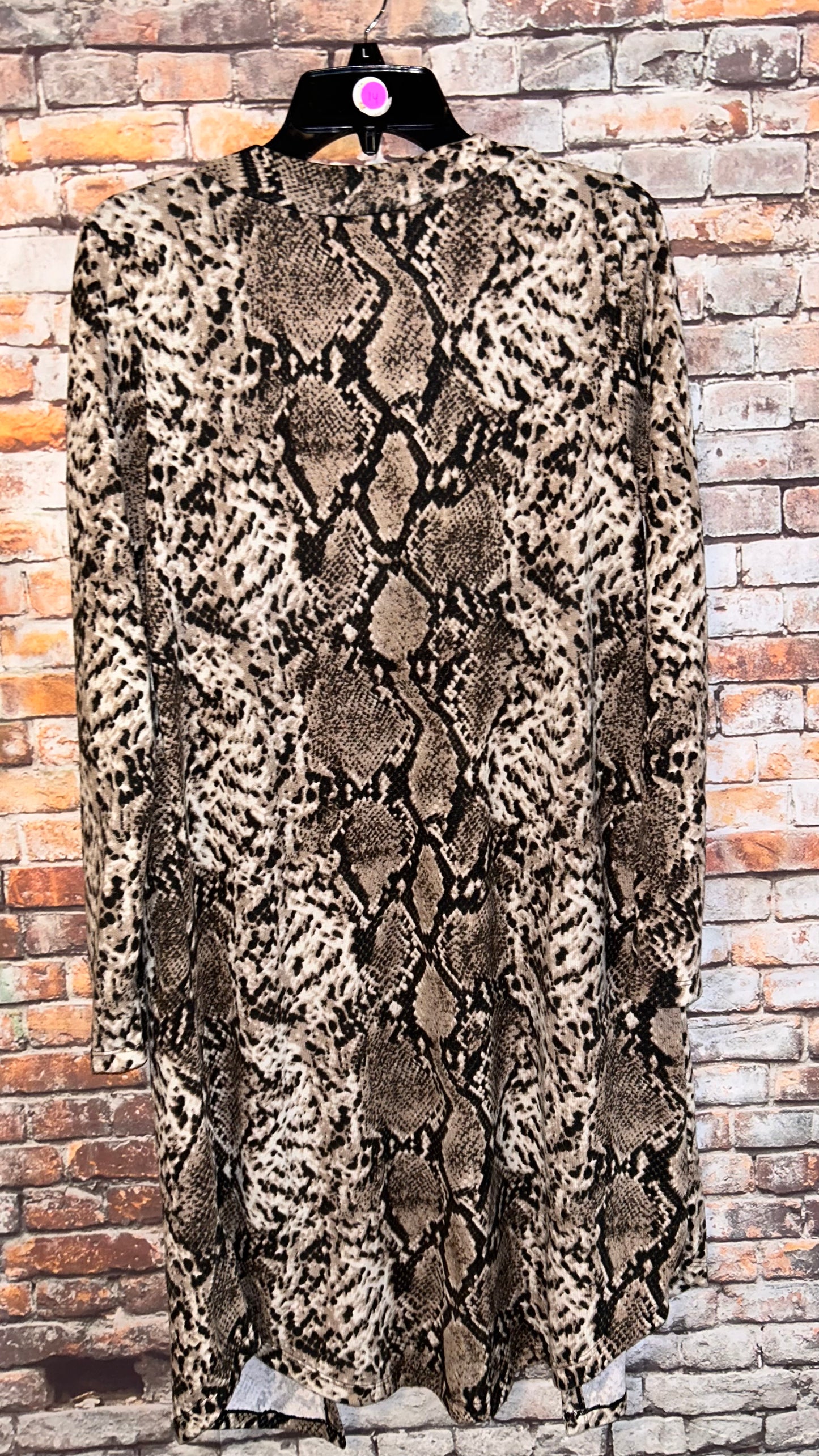 Women’s size medium roomy with stretch cardigan