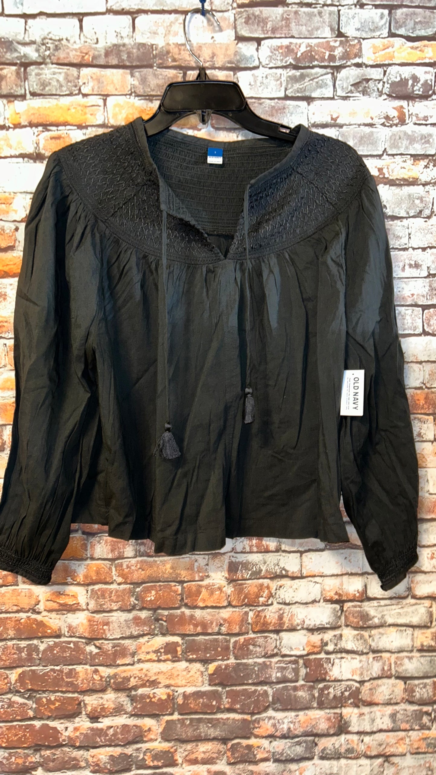 Women’s Top size Small Roomy fits a medium too