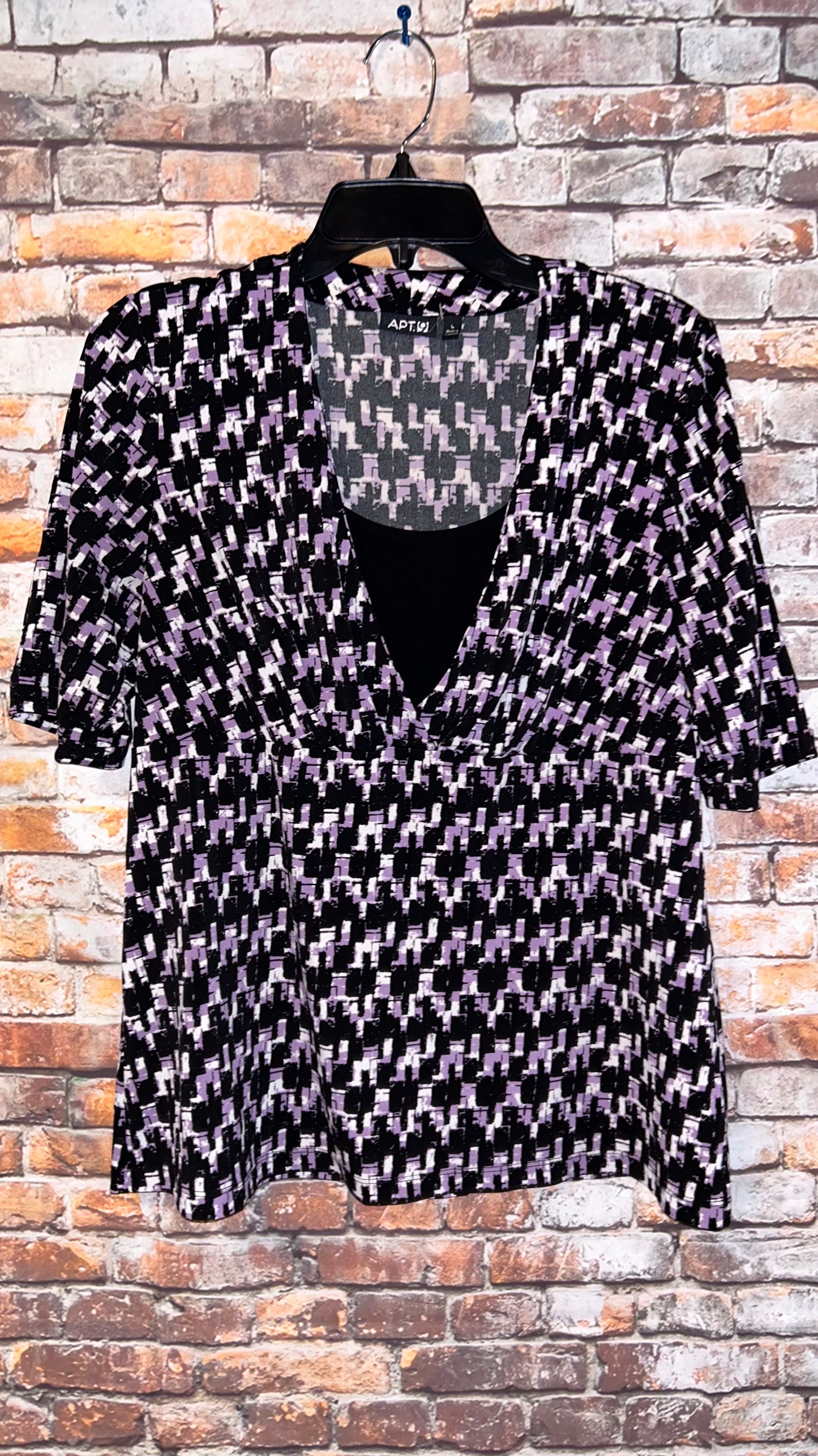 Women’s top size Large With stretch