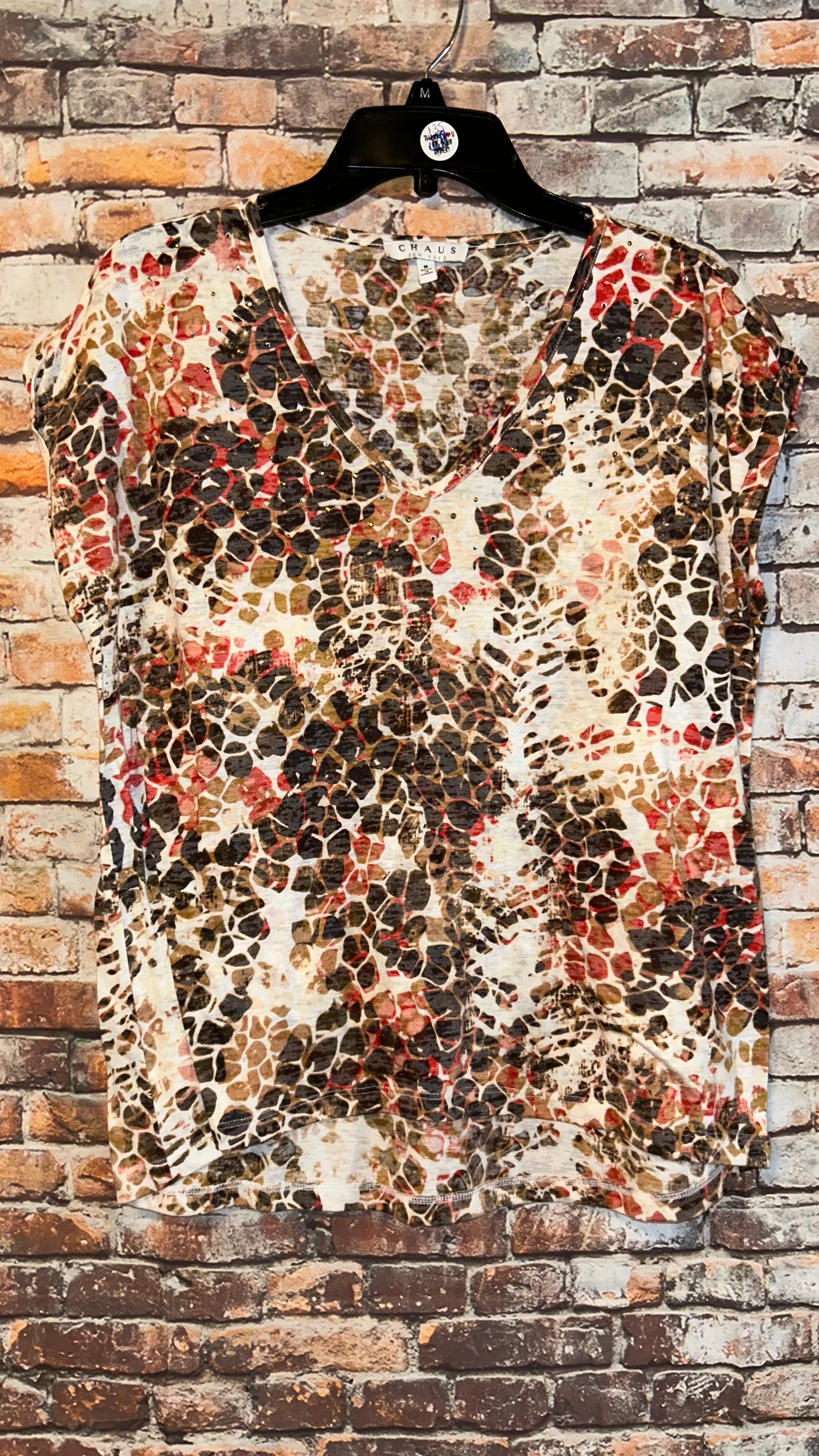 Women’s top size Medium roomy With stretch