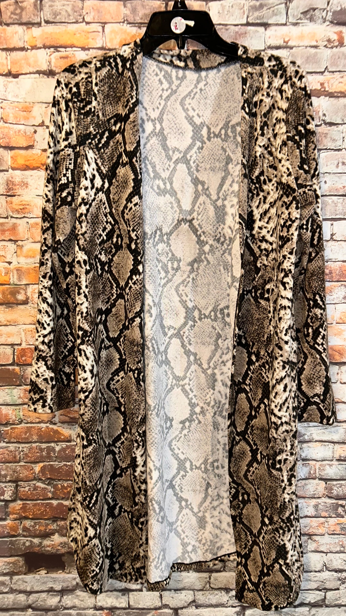 Women’s size medium roomy with stretch cardigan