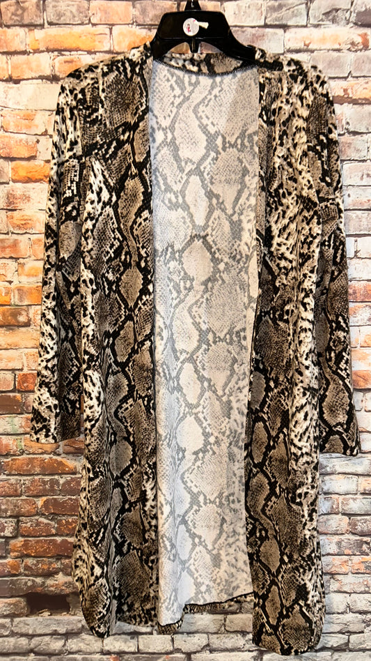 Women’s size medium roomy with stretch cardigan