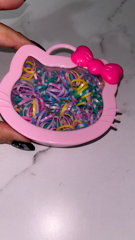 Hello kitty case with hair ties