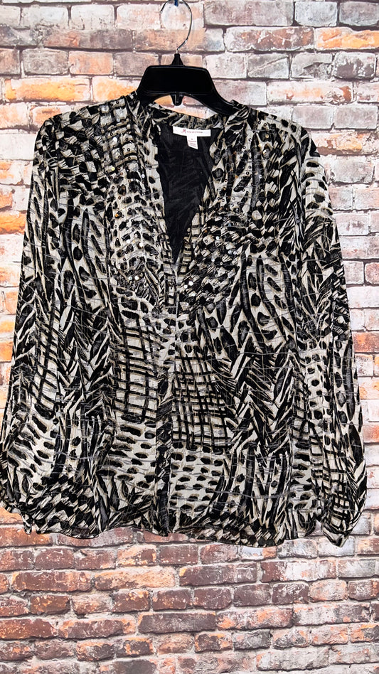 Women’s top size 10 fits like a Medium no stretch