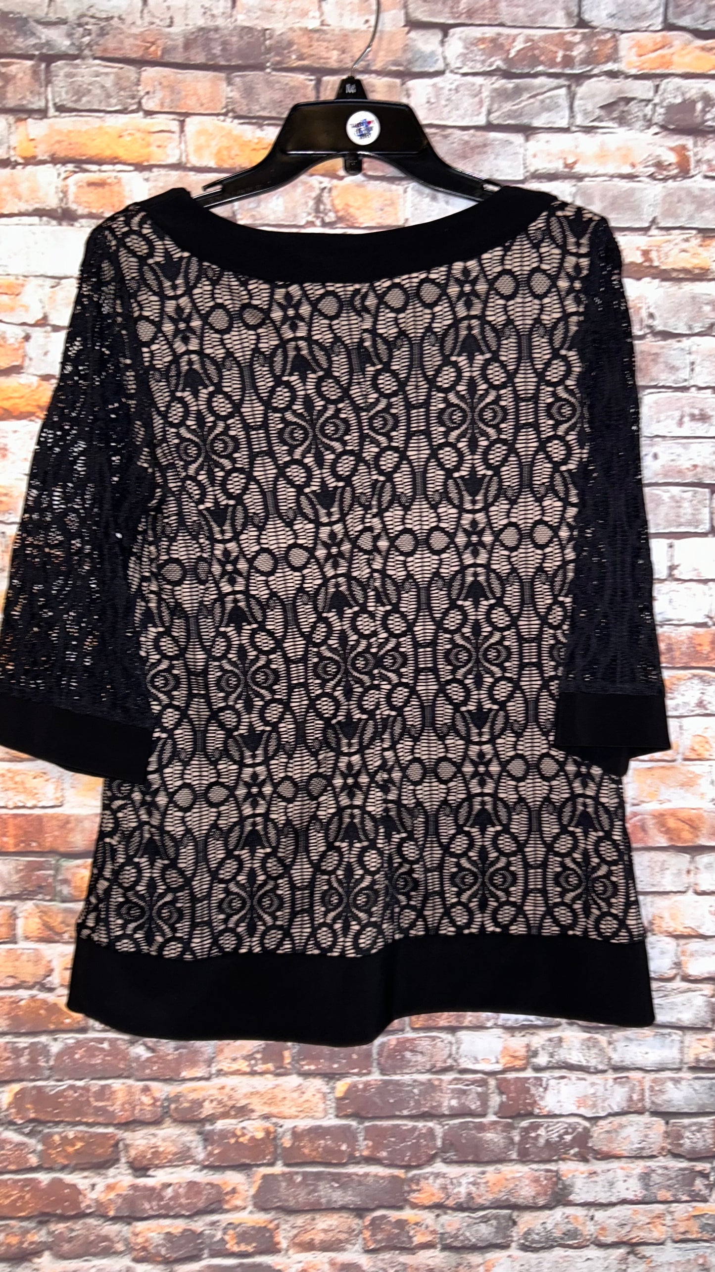 Women’s top size 8 Petite fits like a medium With stretch