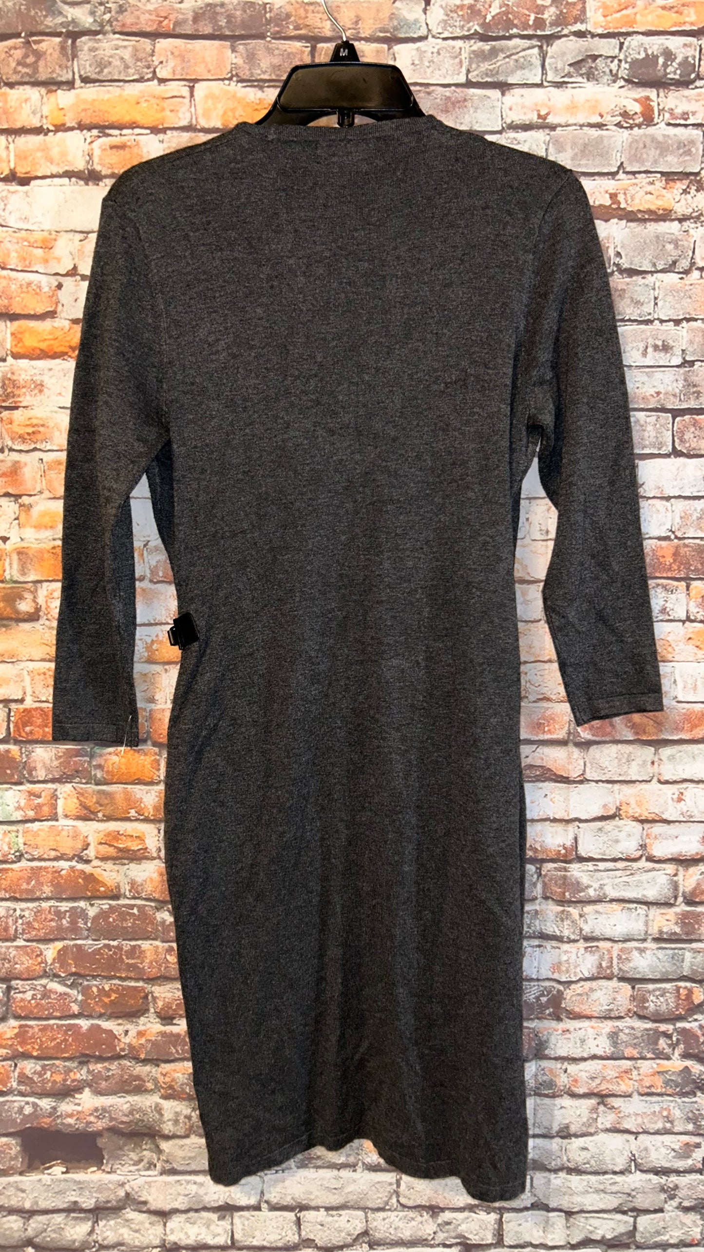 Women’s size medium dress fits like a 3/4 with stretch