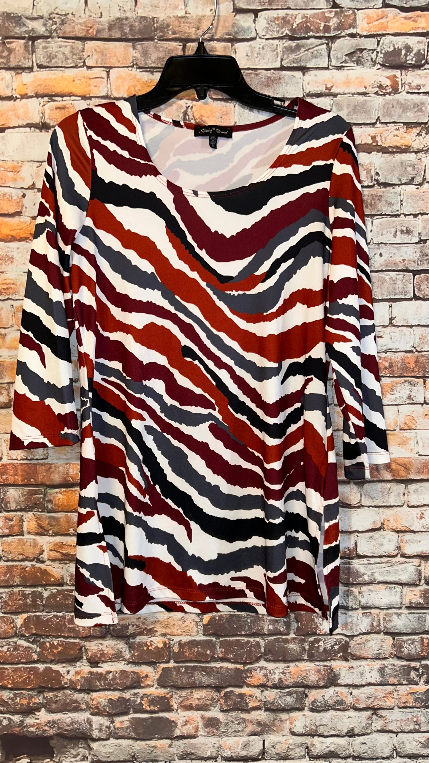 Women’s top size Small With stretch