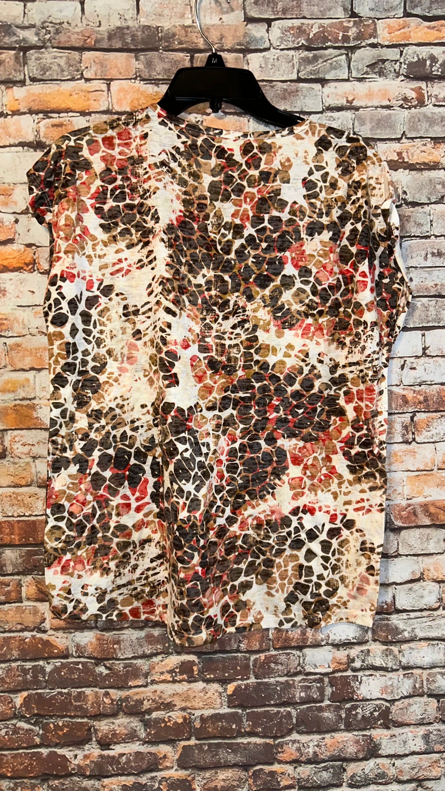 Women’s top size Medium roomy With stretch