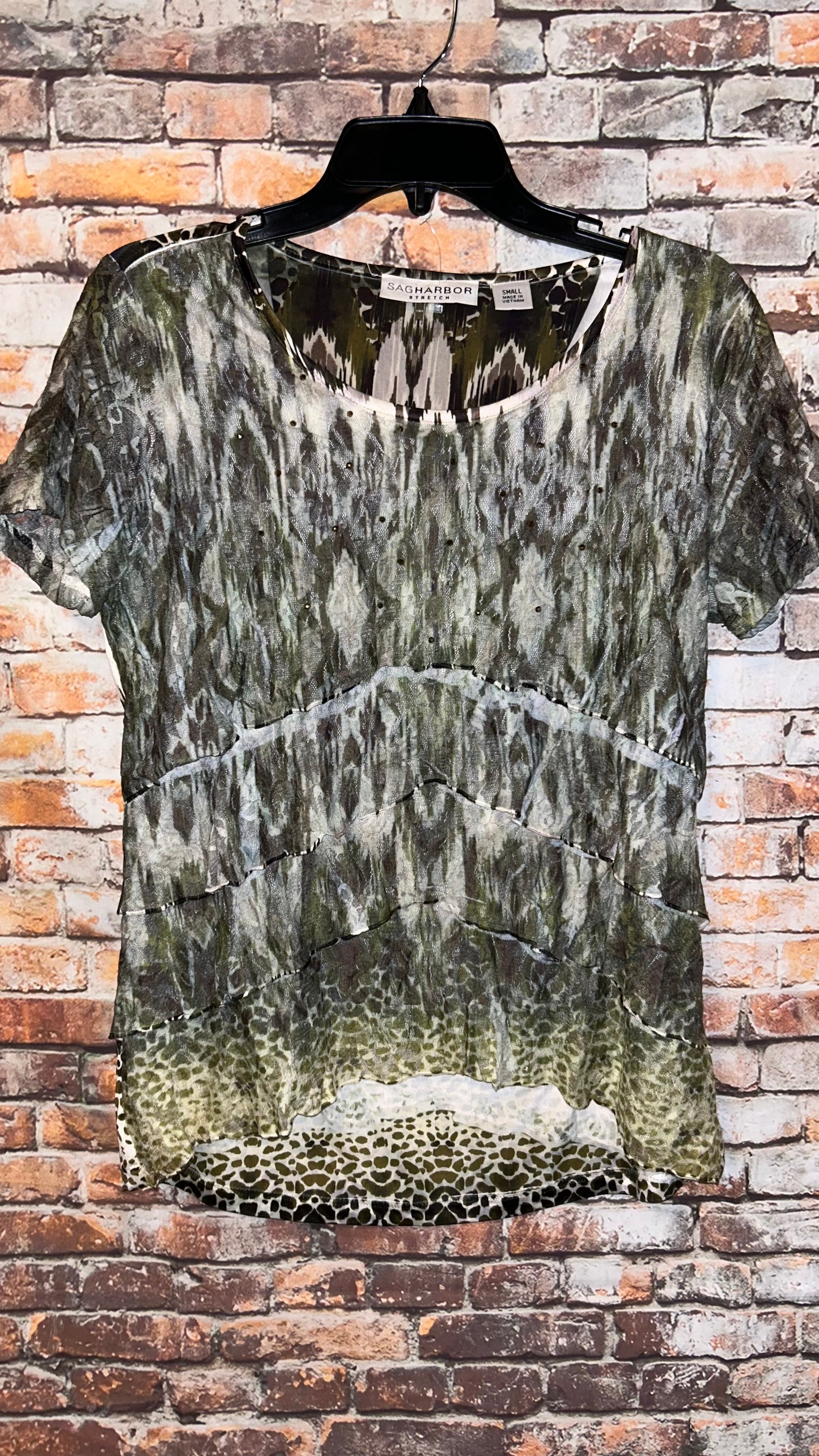 Women’s top size Small With stretch