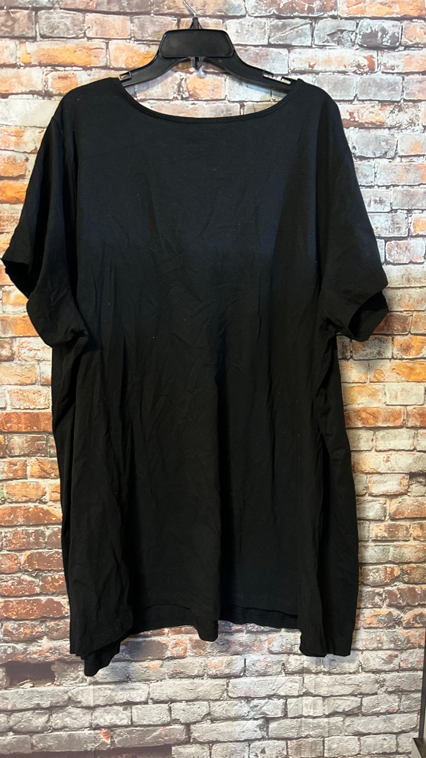 Women’s size 4x fits a nice roomy 3x top With stretch